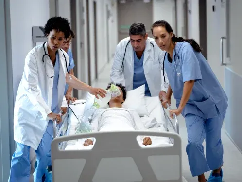 Doctors attending to a patient