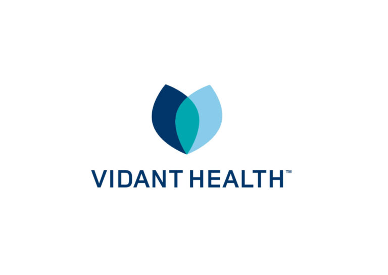 a blue and green logo with the words vibrant health