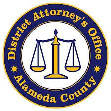 a blue and yellow seal with the words district attorney's office