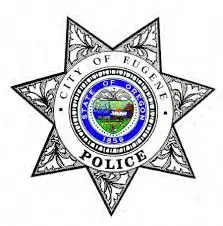 a police badge is shown on a white background