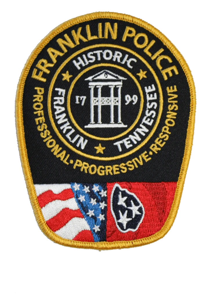 a franklin police patch on a black background