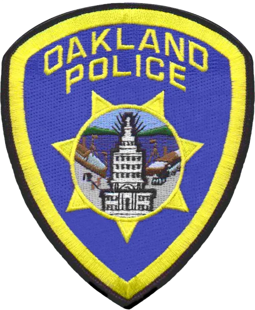 the oakland police badge is shown in blue and yellow