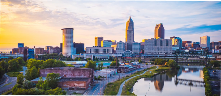 a city skyline with a river running through it