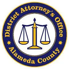 a blue and yellow seal with the words district attorney's office