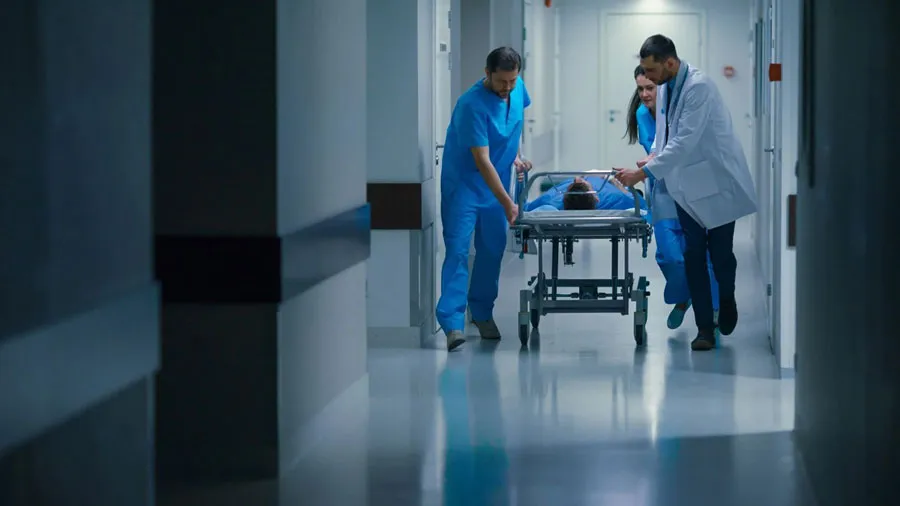 a group of doctors walking down a hallway
