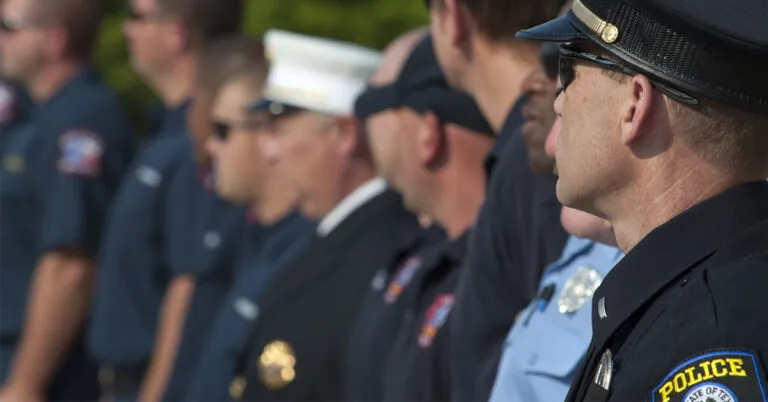 a group of police officers standing next to each other