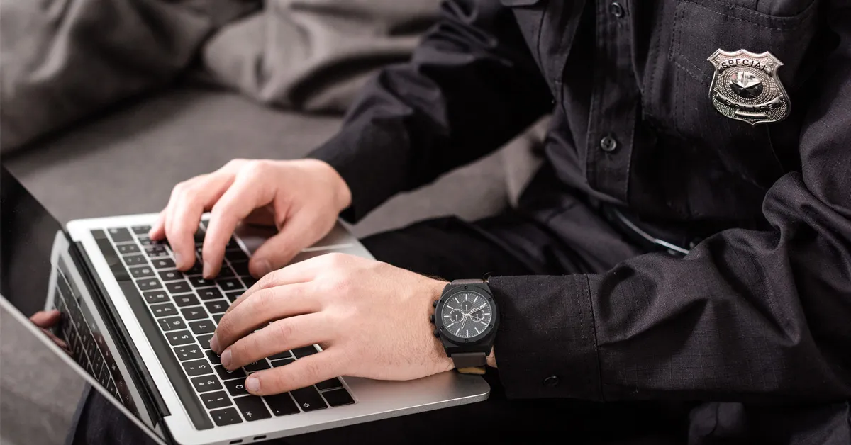 Officer using a laptop computer