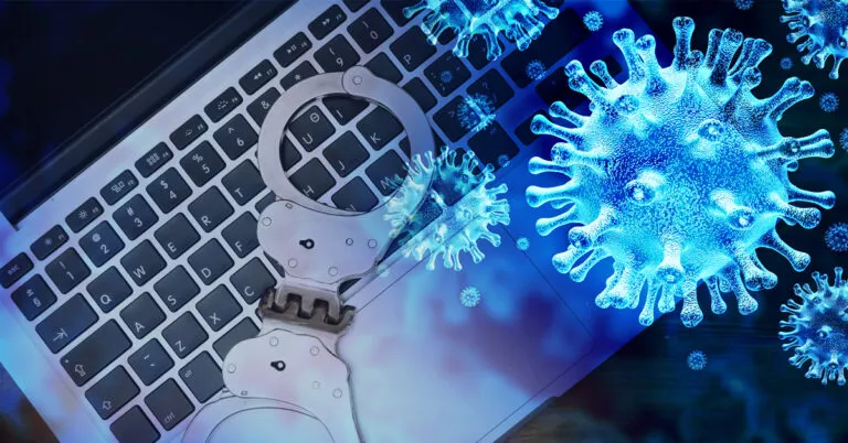 a laptop computer covered in blue and white snowflakes